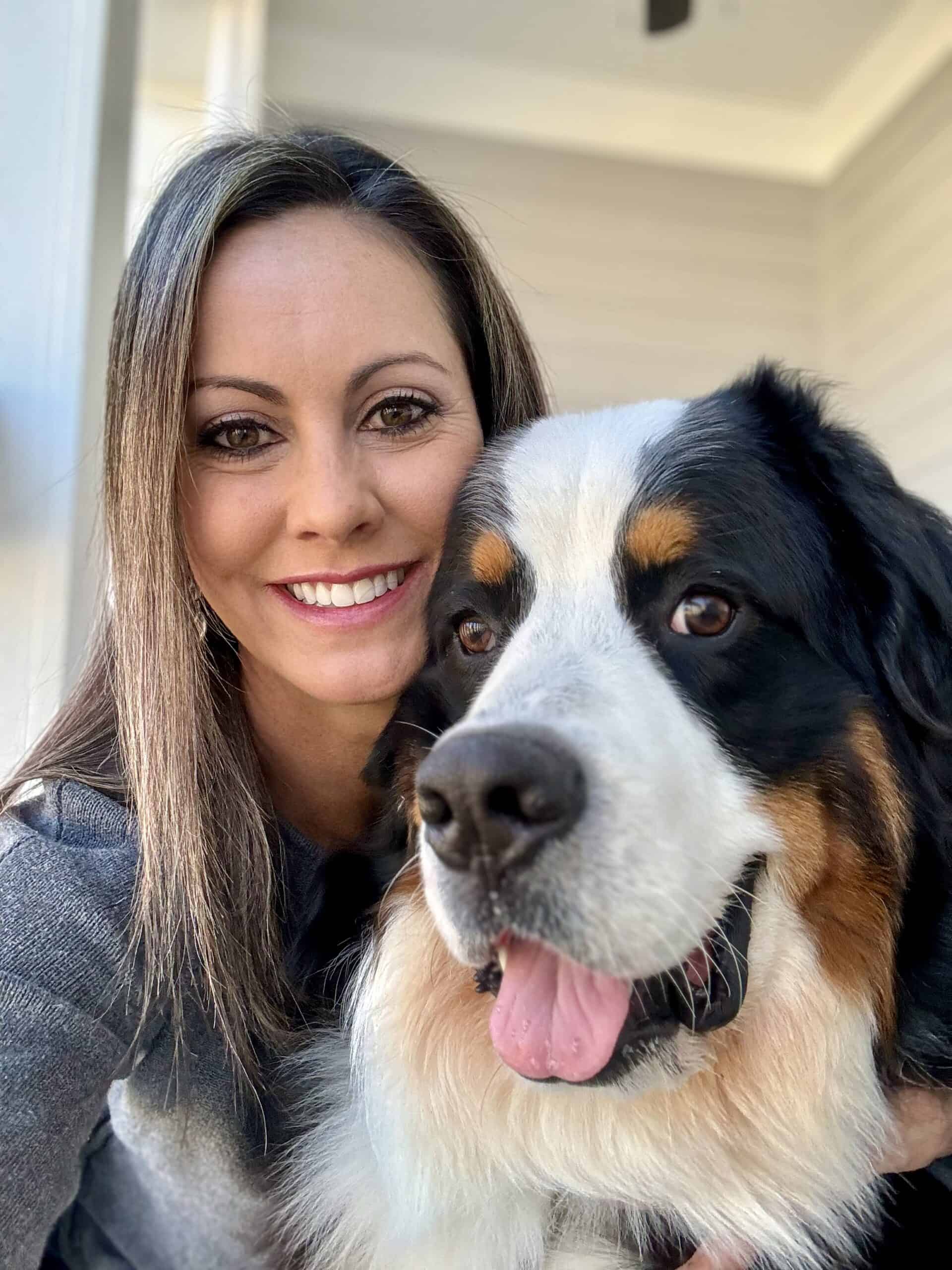 A close up of Riggie The Berner and his mom, Katie, taking a selfie. 