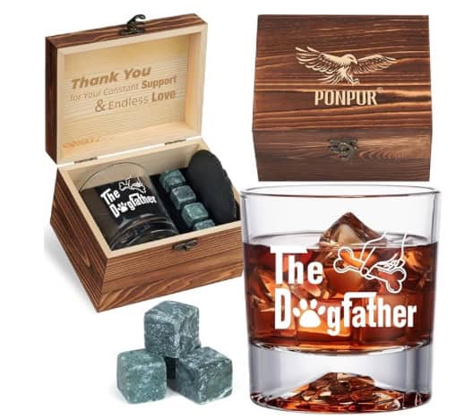 A small wooden box, 4 whiskey stones, and a rocks glass that says "The Dogfather", which is featured in our Father's Day gift guide.