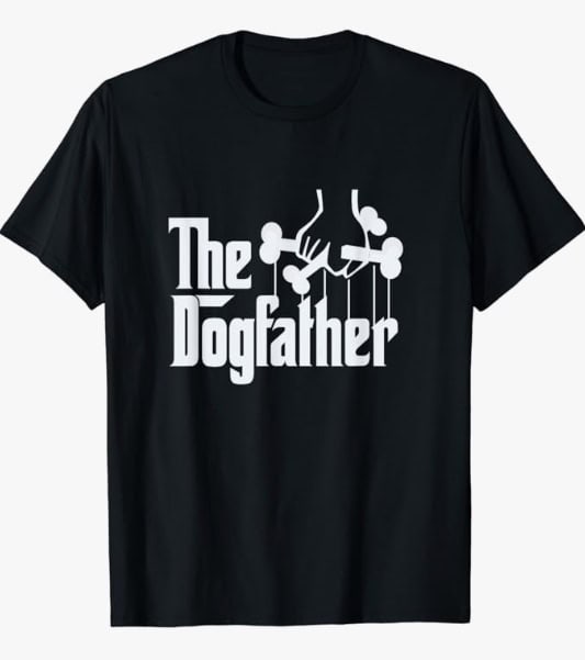 A black t-shirt with the words "The Dogfather" and a hand holding 2 bones, which is featured in the Father's Day Gift Guide.