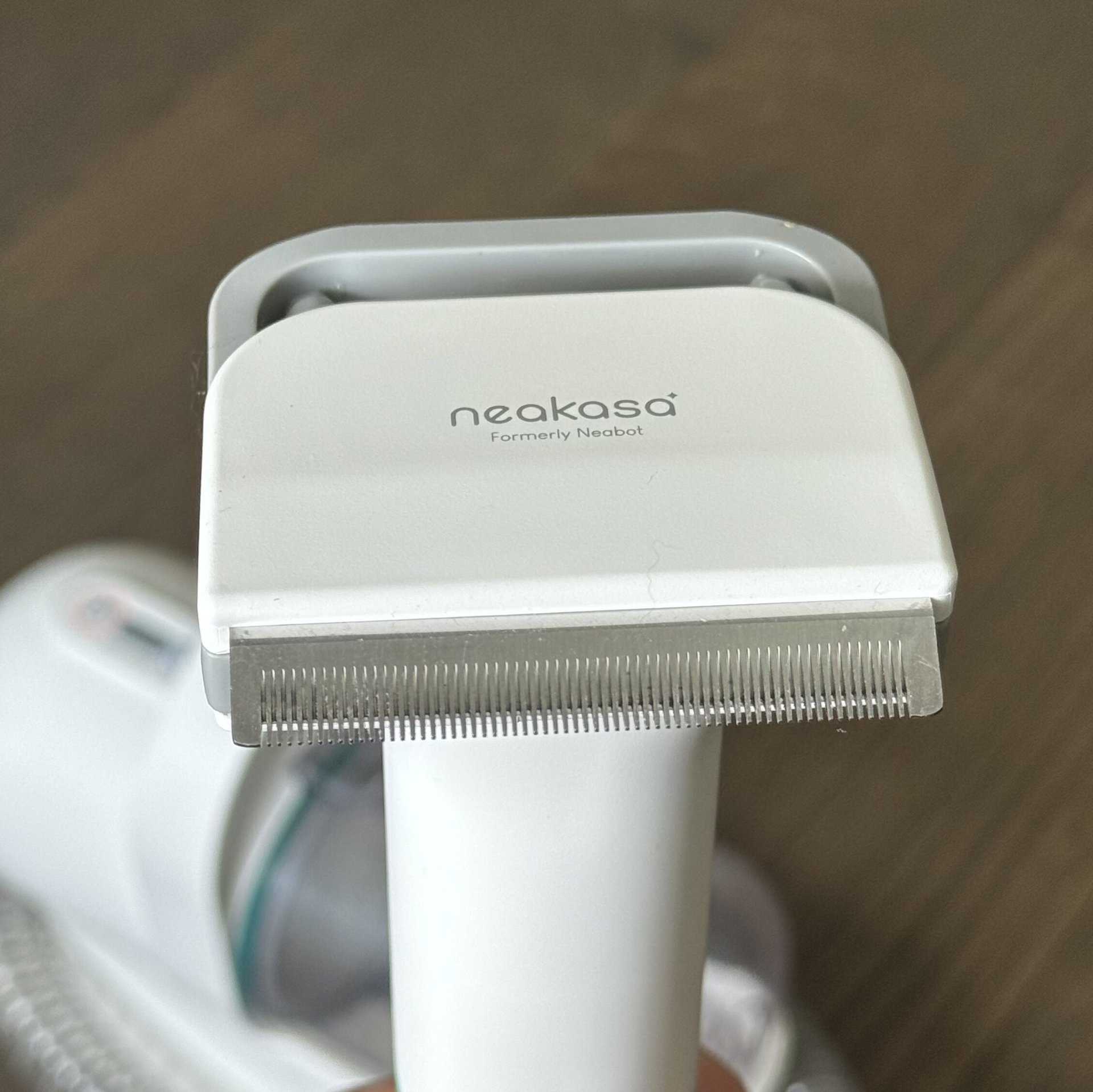 A Furminator-style dog brush attachment for the Neakasa Pet Grooming Vacuum System.