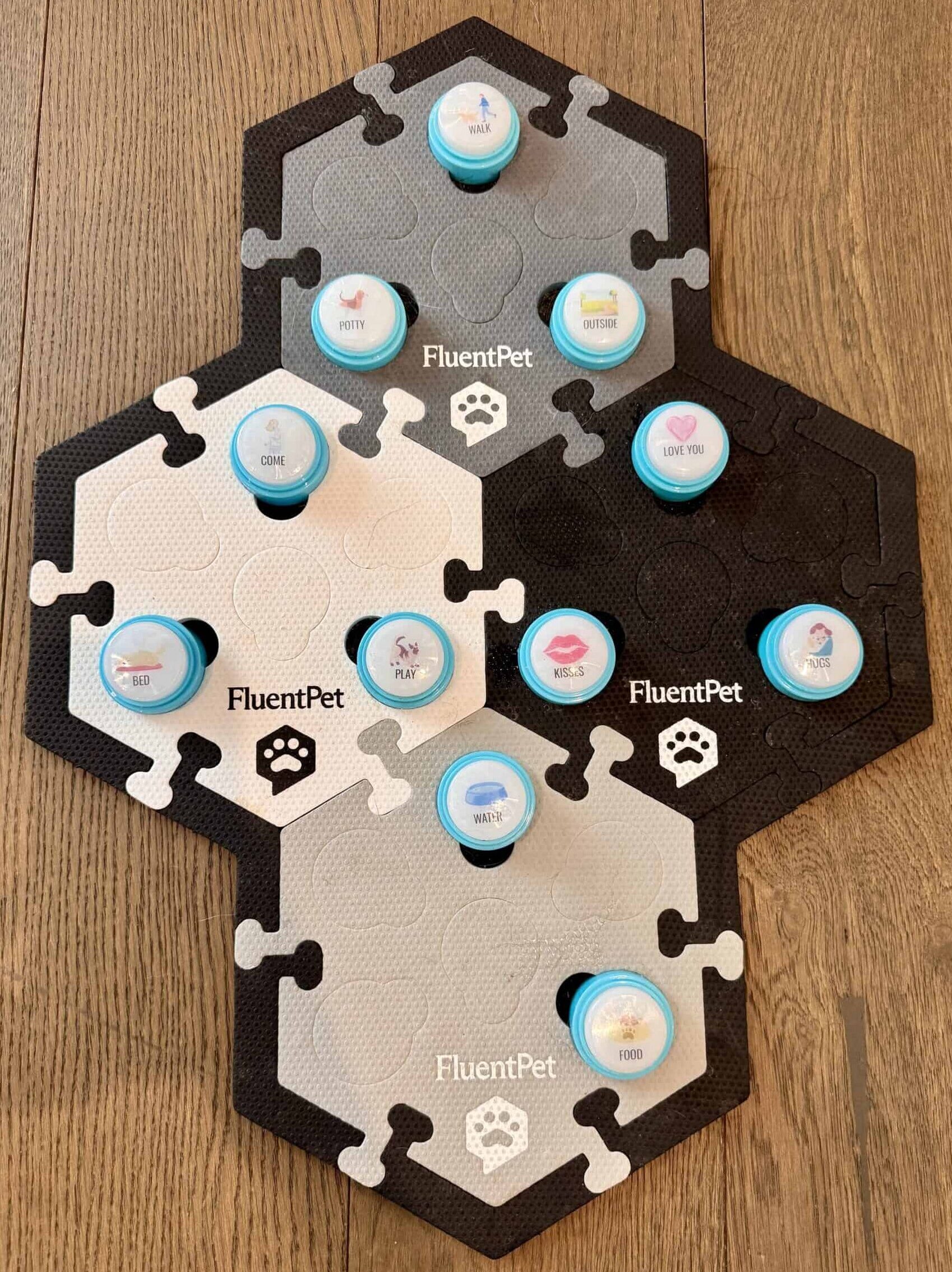 A FluentPet soundboard featuring 4 colored textiles with sound buttons.